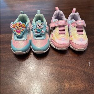Two pairs of size 7 toddler shoes